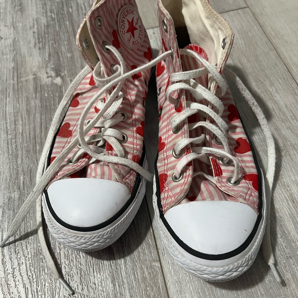 Pink striped Converse with heart design